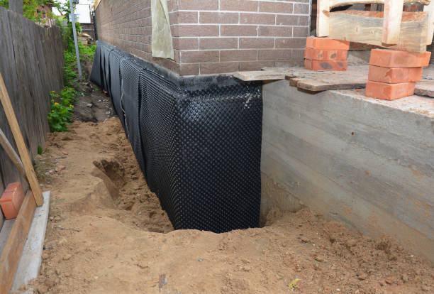 Happy homeowners after waterproofing job in McFarland